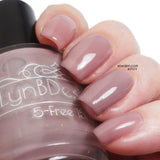 That’s Taupe from the “Tonally Awesome" Nail Polish Collection 15ml 5-Free